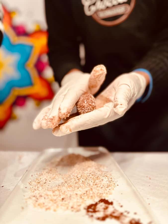 1.5h Cusco Chocolate Workshop - Truffles & Hot Chocolate - Making chocolate in a San Blas restobar