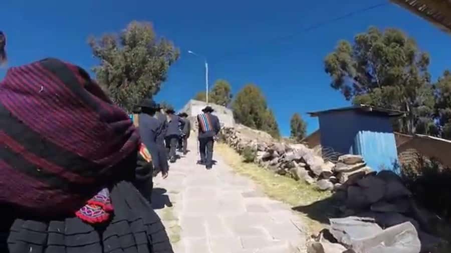 2-Day Amantani Island homestay overnight Tour from Puno - Uros: walking on islands made from totora reeds