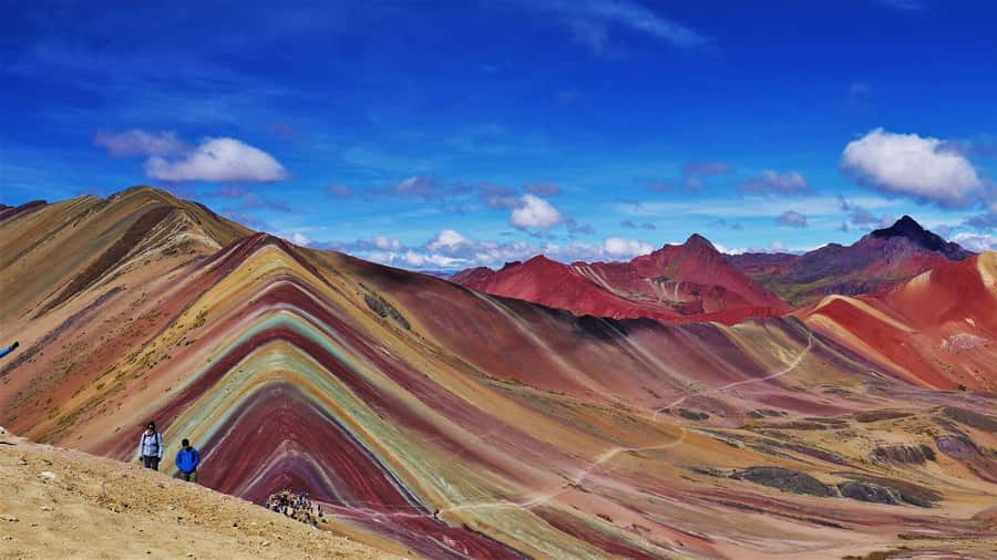 Cusco: Rainbow Mountain Tour with Meals & Red Valley Option - The descent, lunch, and three-hour ride home