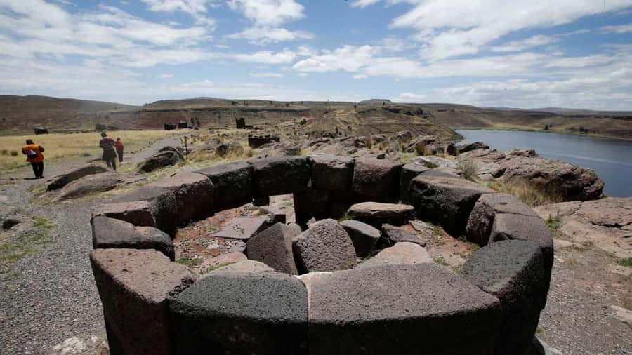 Discover the Celestial Wonder of Sillustani: Towers of Time - A local house, typical food, and camelids