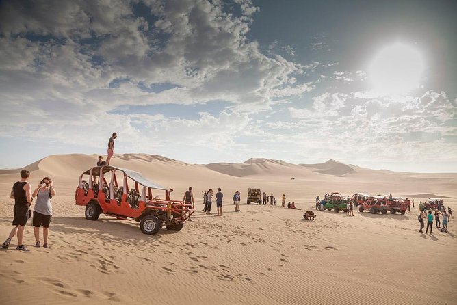 Dune buggy in Huacachina - Sandboarding from the top of a dune