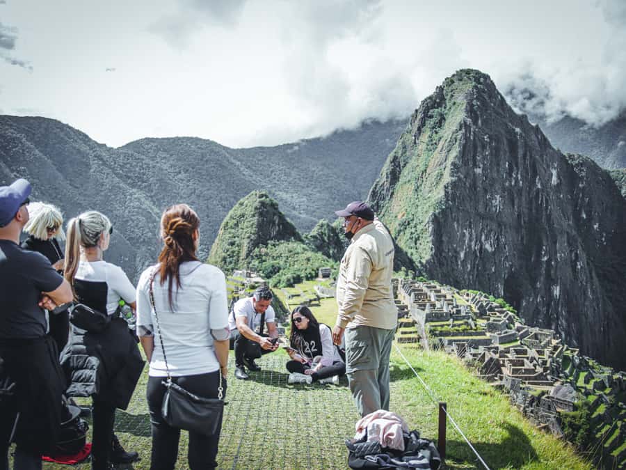 From Cusco: 2-Day Sacred Valley and Machupicchu by Train - Awana Kancha and the alpaca stop