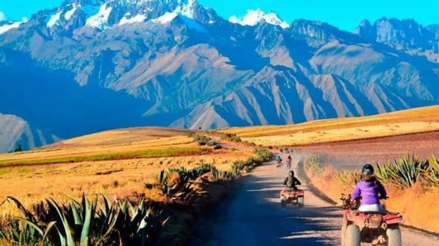 from Cusco: Atv Tour Maras, Moray, and Salt Mines - Riding through Sacred Valley scenery