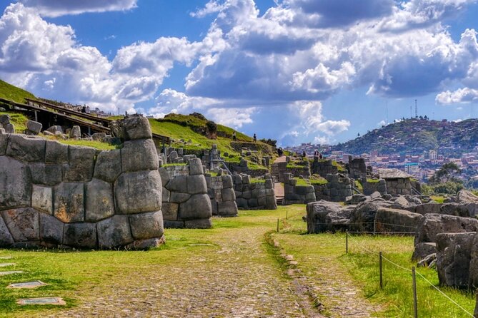 From Cusco City Tour Four Ruins Half Day Tour - What the guide and group setup mean for you