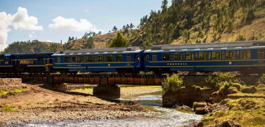From Cusco: Train Ride and Guided Tour of Machu Picchu - Entering Machu Picchu with a private guide