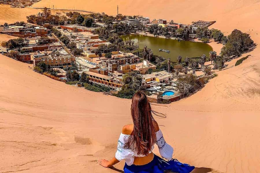 From Huacachina: Sandboarding and Dune Buggy Tour + Income - Leaving Huacachina Lagoon for the Ica Desert