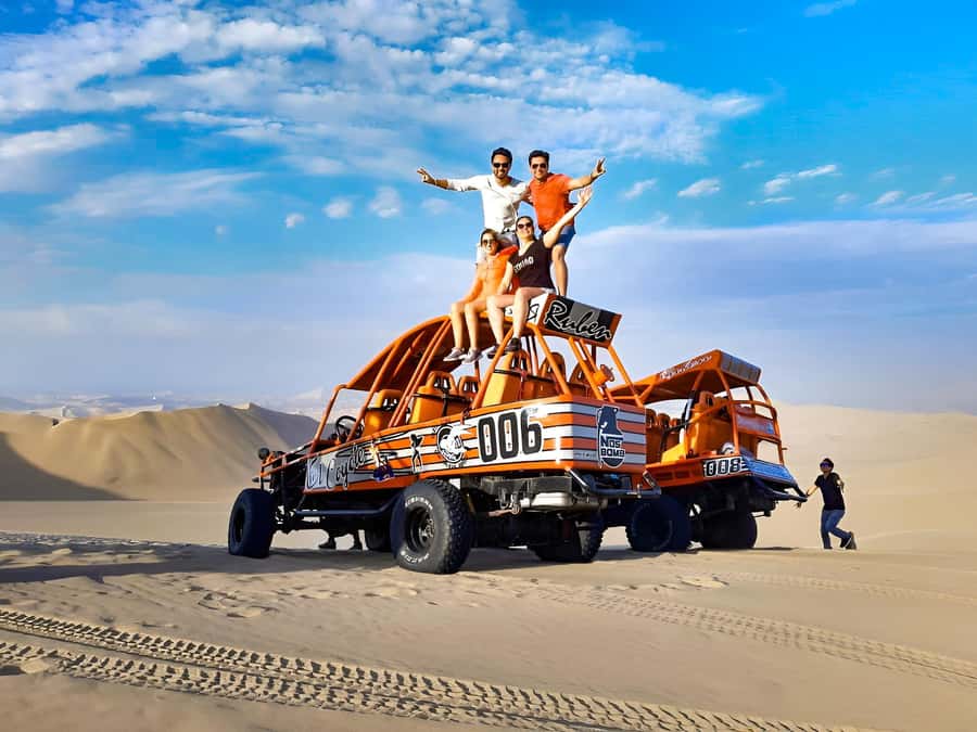 From Huacachina: Sandboarding and Dune Buggy Tour + Income - Learning basic sandboarding on the dunes