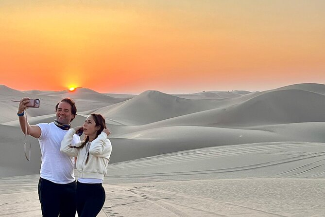 From Huacachina: Sunset buggy and sandboarding - Sunset brings the speed to a good close