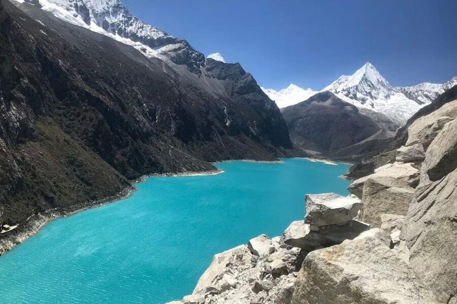 From Huaraz: Full-Day Trek to Parón Lagoon - Walking beside the turquoise water