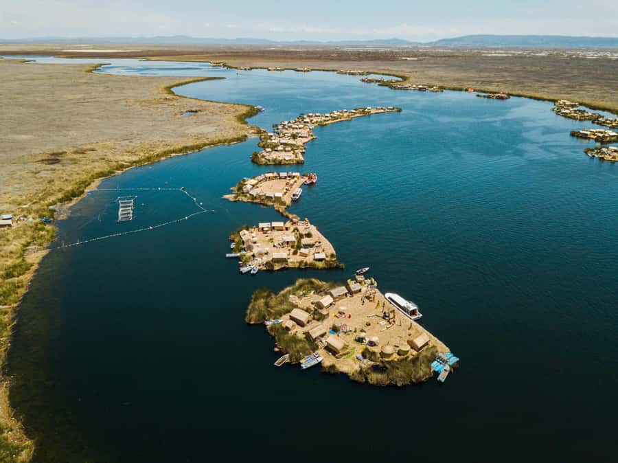 From Puno: Excursion to Uros and Taquile Islands + Income - Lunch with a local family
