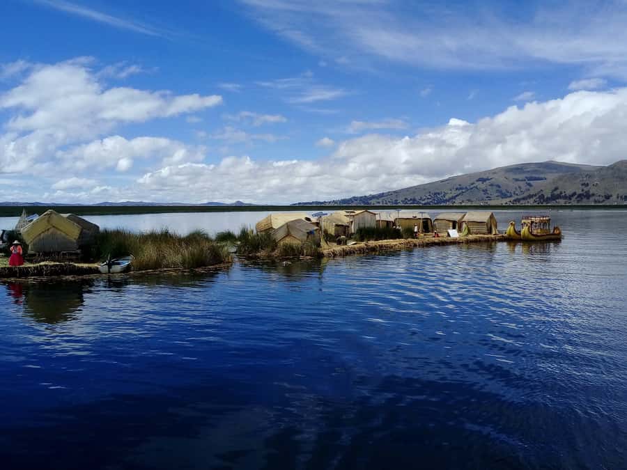 From Puno: Floating Islands of the Uros Half-Day Tour - Guides who add meaning to the visit