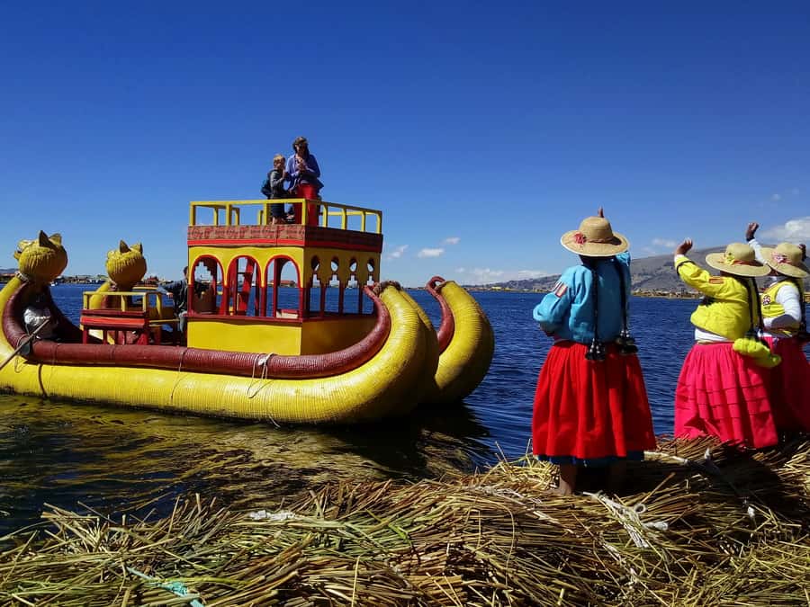 From Puno: Floating Islands of the Uros Half-Day Tour - Crafts, songs, and the sales element