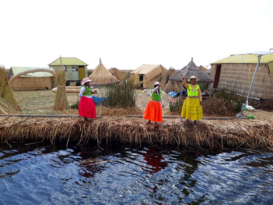 From Puno: full day tour to Uros and Taquile with Lunch - Seeing the floating Uros Islands
