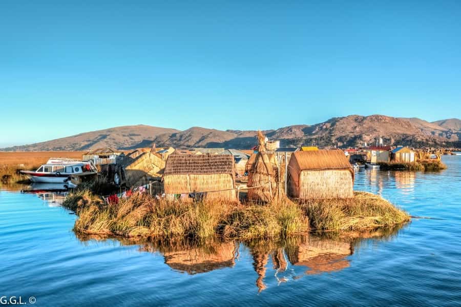 FromPuno: Uros and Amantani Islands Full-Day Tour with Lunch - Uros floating islands: a short visit with a big visual impact