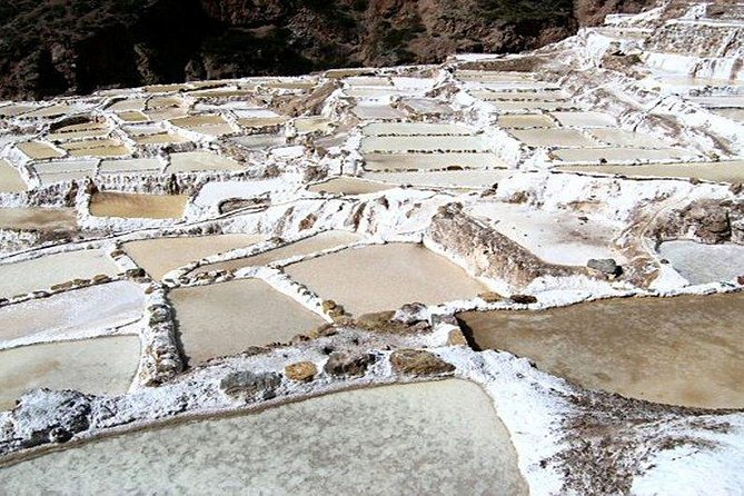 Full-Day Excursion to Sacred Valley, Pisac and Ollantaytambo from Cusco - Maras turns salt into a living local industry