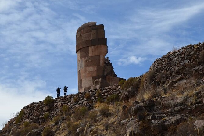 Full-Day Tour of Uros, Taquile and Sillustani from Puno - Taquile’s uphill path, lake trout, and textile tradition