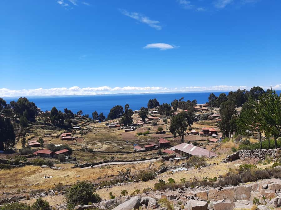 LAKE TITICACA 2-DAY EXCURSION: UROS AMANTANI AND TAQUILE + 3 MEALS - Amantani and the family welcome