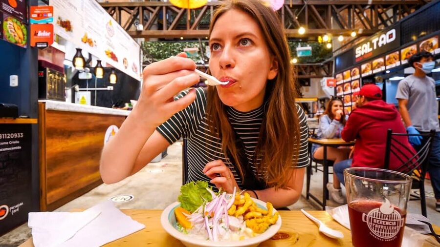 Lima: Food Tour on Local Market - Bolivarsito Bar finishes with fruit and a Pisco Sour option
