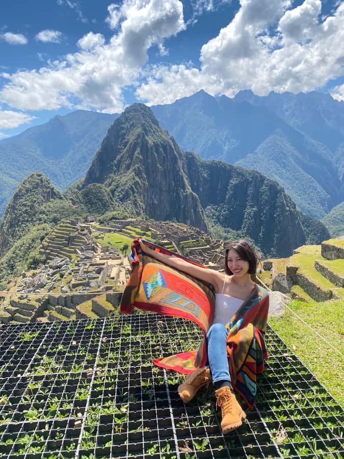 Machu Picchu: 1-day tour by Vistadome Panoramic train - Entering Machu Picchu with a guide