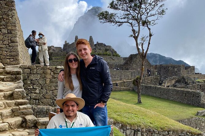 Machu Picchu Private Archaeological and Historical Guided Tour - The first uphill walk and the classic Machu Picchu view