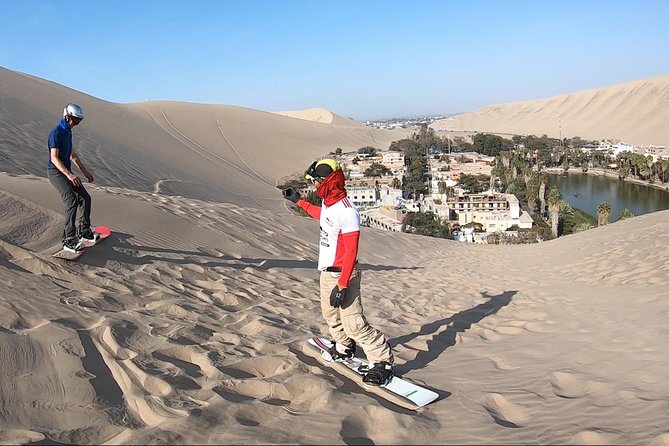 Professional Sandboard & Sandski Tour in Ica, Peru - Learning to ride sand near Huacachina Oasis