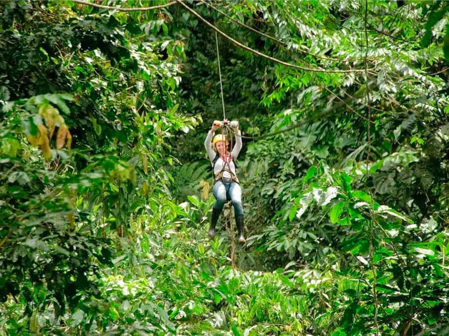 Puerto Maldonado: Jungle Adventure |Zipline + Canopy + Kayak - Walking the hanging bridge through the jungle