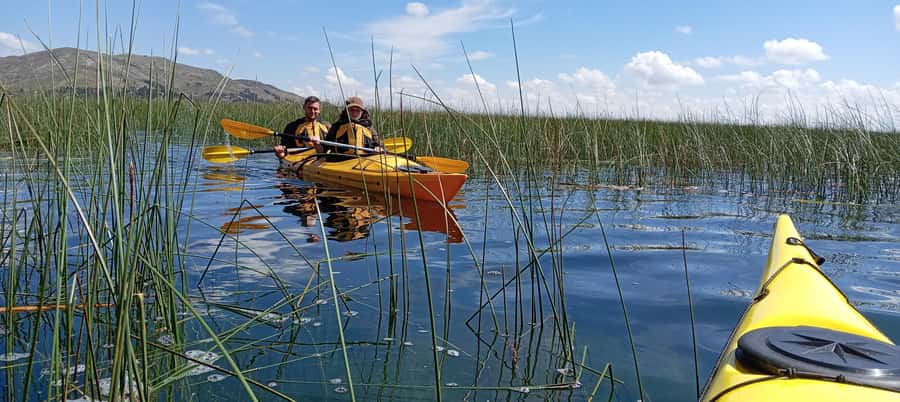 Puno: 2-day Uros Kayak Tour with Homestay at Amantani Island - Paddling from Puno toward the Uros Islands