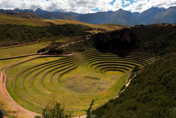 Sacred Valley VIP Tour with Maras and Moray from Cusco - Chinchero, Inca foundations and a busy market